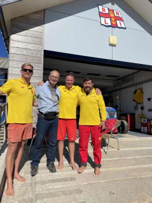 Richard Wright with the RNLI lifeguards who saved him